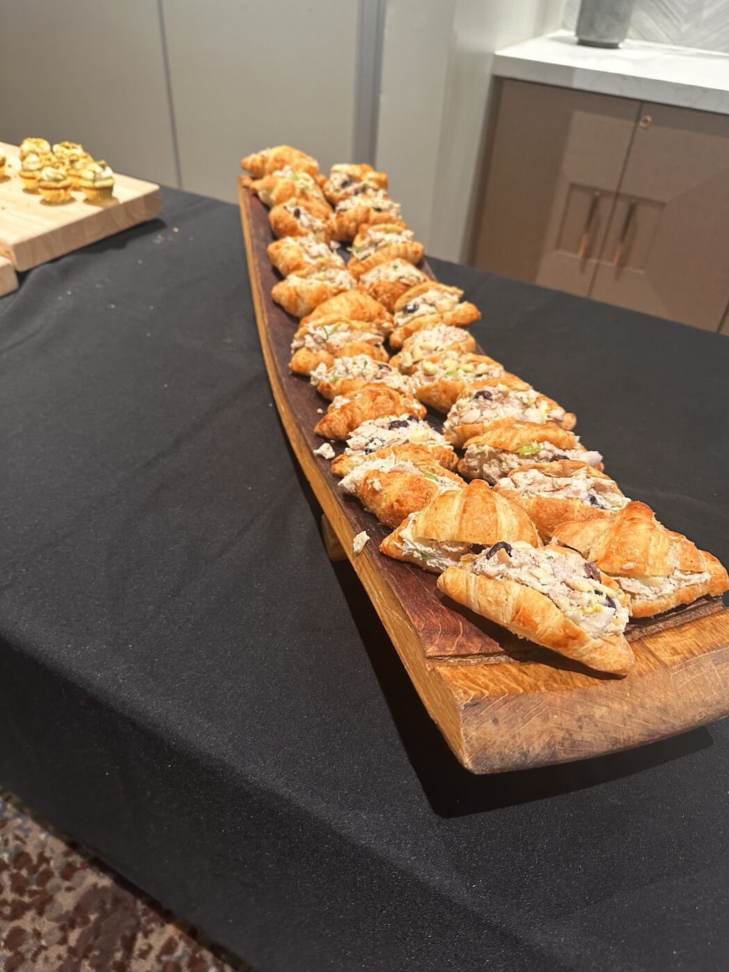 A platter of freshly made croissant sandwiches