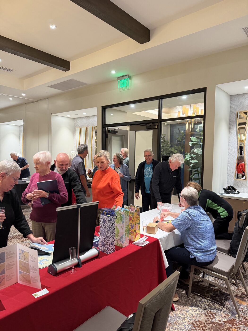 The welcome and registration table greeting arriving guests